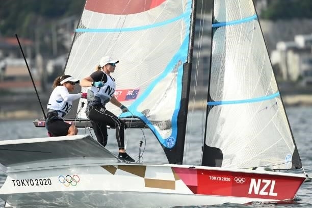 New Zealands Alexandra Maloney and Molly Meech compete in the women's skiff 49er FX race during the Tokyo 2020 Olympic Games sailing competition at...