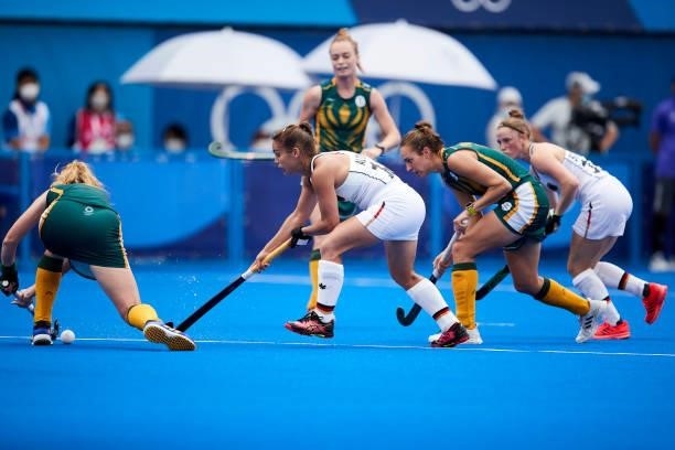 Lisa Altenburg of Germany battle for the ball during the Women's Pool A - Hockey Match between South Africa and Germany on day seven of the Tokyo...
