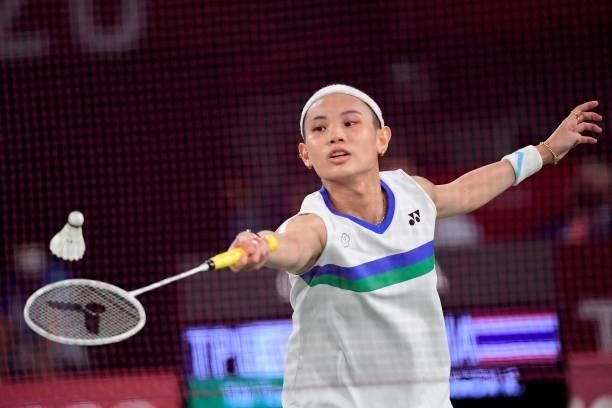 Taiwan's Tai Tzu-ying hits a shot to Thailand's Ratchanok Intanon in their women's singles badminton quarter final match during the Tokyo 2020...