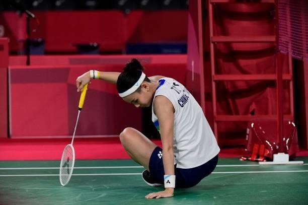 Taiwan's Tai Tzu-ying gets up from the court after a rally with Thailand's Ratchanok Intanon in their women's singles badminton quarter final match...