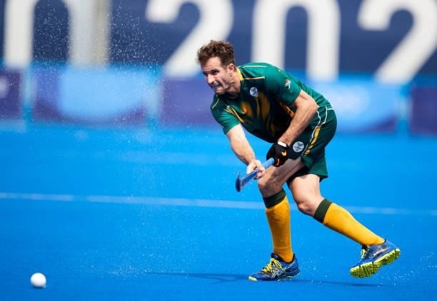 Timothy Drummond of South Africa controls the ball during the Men's Pool B - Hockey Match between Canada and South Africa on day seven of the Tokyo...
