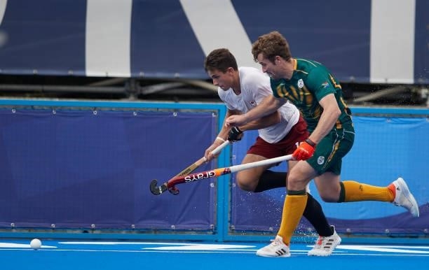 Oliver Scholfield of Canada battle for the ball during the Men's Pool B - Hockey Match between Canada and South Africa on day seven of the Tokyo 2020...