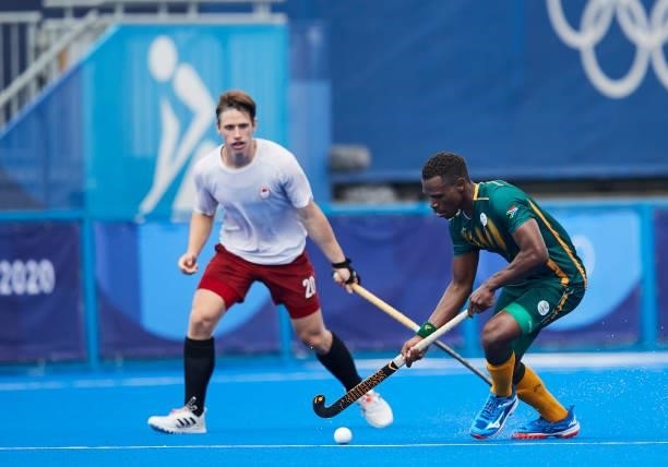 Keenan Horne of South Africa controls the ball during the Men's Pool B - Hockey Match between Canada and South Africa on day seven of the Tokyo 2020...