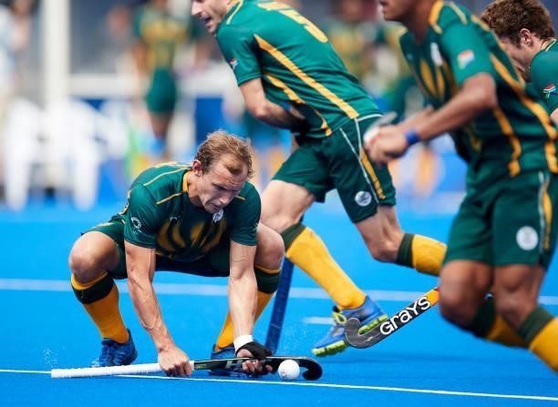 Nicholas Spooner of South Africa controls the ball during the Men's Pool B - Hockey Match between Canada and South Africa on day seven of the Tokyo...