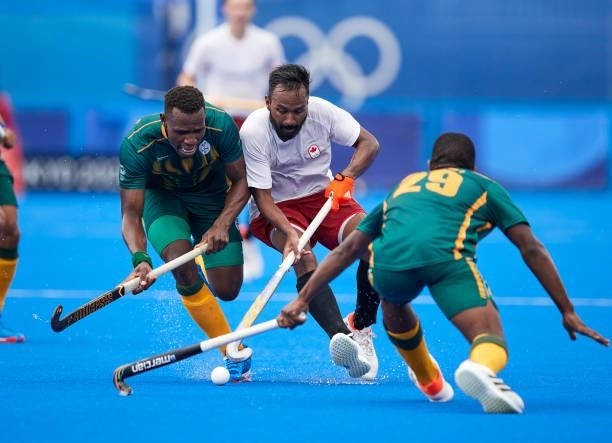 Keegan Pereira of Canada controls the ball during the Men's Pool B - Hockey Match between Canada and South Africa on day seven of the Tokyo 2020...