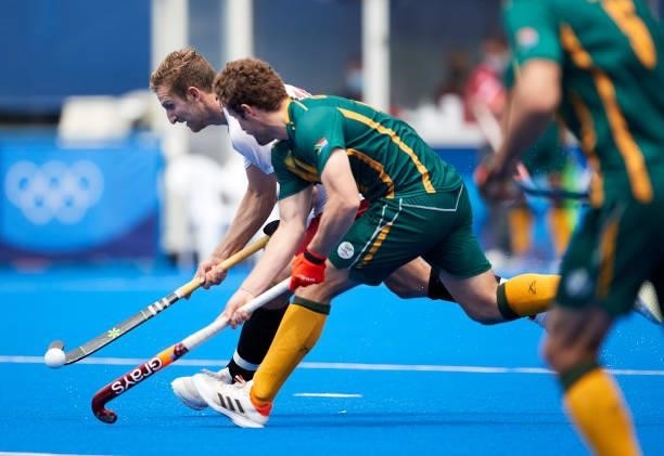 Gordon Johnston of Canada battle for the ball during the Men's Pool B - Hockey Match between Canada and South Africa on day seven of the Tokyo 2020...