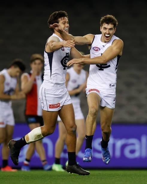 Jack Silvagni and Tom Williamson of the Blues celebrate during the 2021 AFL Round 20 match between the St Kilda Saints and the Carlton Blues at...