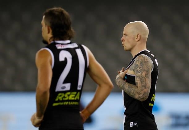 Ben Long and Zak Jones of the Saints look dejected after a loss during the 2021 AFL Round 20 match between the St Kilda Saints and the Carlton Blues...