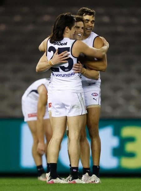 Zac Fisher, Marc Murphy and Jack Martin of the Blues celebrate during the 2021 AFL Round 20 match between the St Kilda Saints and the Carlton Blues...