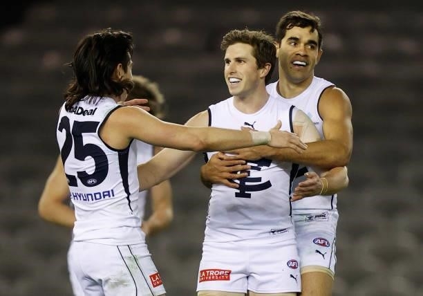 Zac Fisher, Marc Murphy and Jack Martin of the Blues celebrate during the 2021 AFL Round 20 match between the St Kilda Saints and the Carlton Blues...