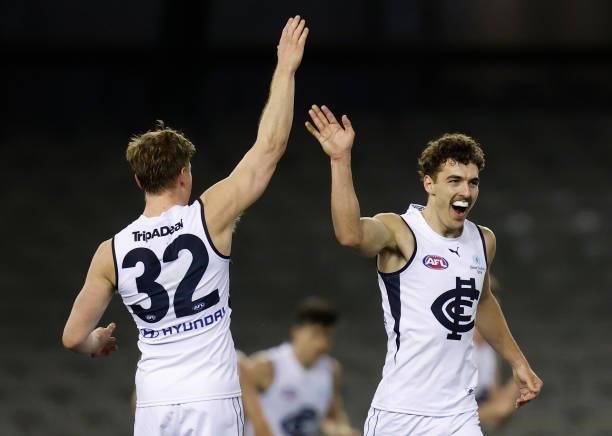 Jack Newnes and Tom Williamson of the Blues celebrate during the 2021 AFL Round 20 match between the St Kilda Saints and the Carlton Blues at Marvel...