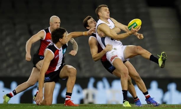 Patrick Cripps of the Blues is tackled by Jack Steele of the Saints during the 2021 AFL Round 20 match between the St Kilda Saints and the Carlton...