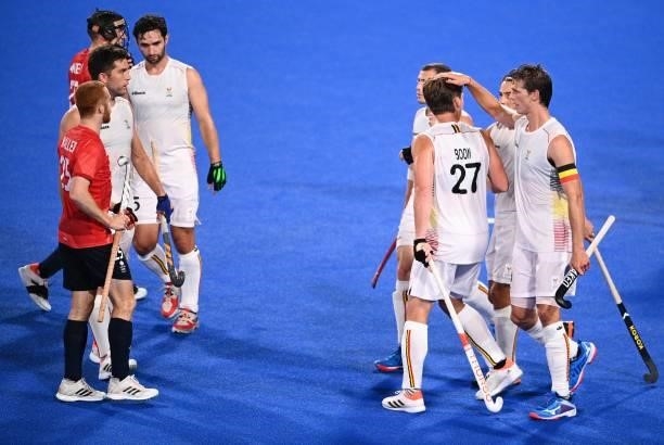 Belgium's Tom Alain Boon celebrates with teammates after scoring against Britain during their men's pool B match of the Tokyo 2020 Olympic Games...