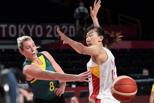 Australia's Liz Cambage passes the ball past China's Han Xu in the women's preliminary round group C basketball match between China and Australia...