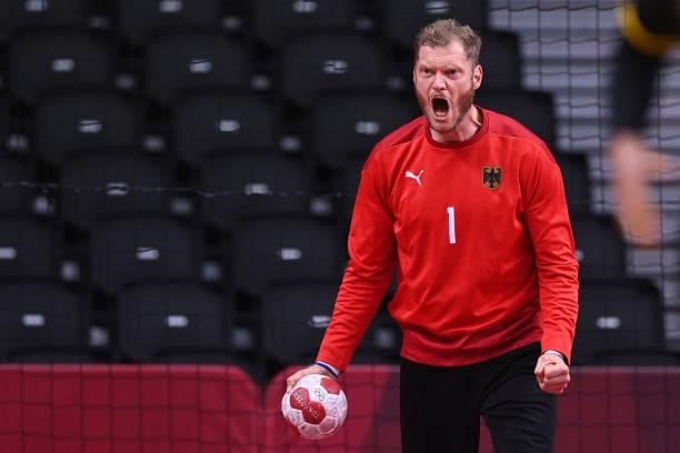 Germany's goalkeeper Johannes Bitter reacts after saving a goal during the men's preliminary round group A handball match between Germany and Norway...