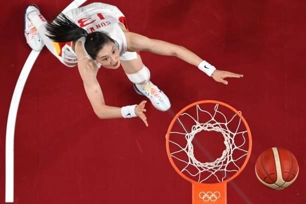 China's Sun Mengran runs for the rebound in the women's preliminary round group C basketball match between China and Australia during the Tokyo 2020...