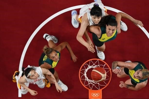 Australian and China's players compete in the women's preliminary round group C basketball match between China and Australia during the Tokyo 2020...
