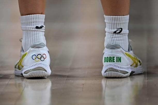 The shoes of Australia's Tess Lavey are pictured before the start of the women's preliminary round group C basketball match between China and...