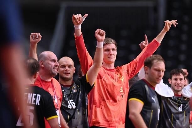 Germany's players react on the sideline during the men's preliminary round group A handball match between Germany and Norway of the Tokyo 2020...