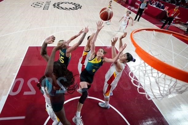 Australia's Bec Allen , Cayla George and China's Li Yueru jump for the ball in the women's preliminary round group C basketball match between China...