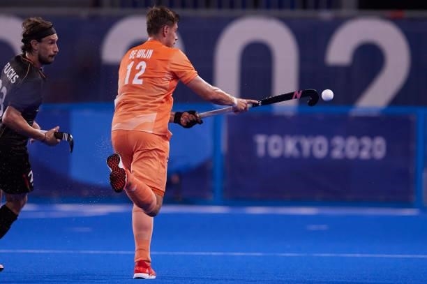 Sander Sebastiaan Robert de Wijn of Netherlands controls the ball during the Men's Pool B - Hockey Match between Germany and Netherlands on day seven...