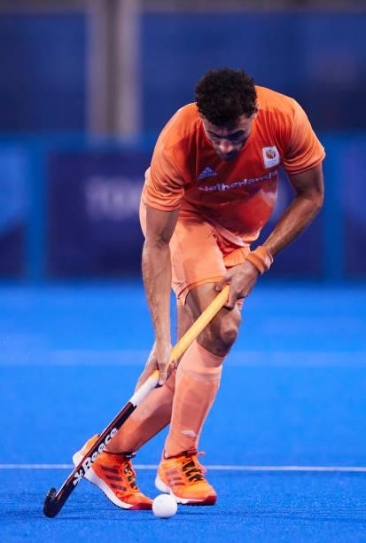 Severiano Boris van Ass of Netherlands controls the ball during the Men's Pool B - Hockey Match between Germany and Netherlands on day seven of the...