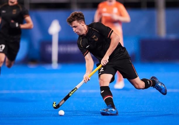 Timm Alexander Herzbruch of Germany controls the ball during the Men's Pool B - Hockey Match between Germany and Netherlands on day seven of the...
