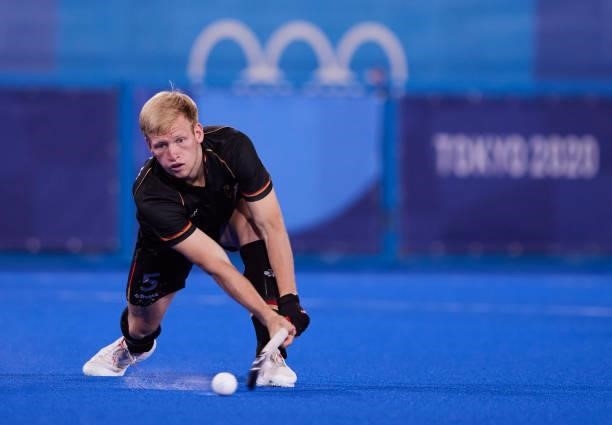 Linus Mueller of Germany controls the ball during the Men's Pool B - Hockey Match between Germany and Netherlands on day seven of the Tokyo 2020...