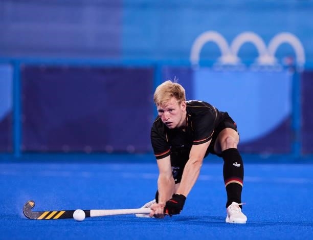 Linus Mueller of Germany controls the ball during the Men's Pool B - Hockey Match between Germany and Netherlands on day seven of the Tokyo 2020...