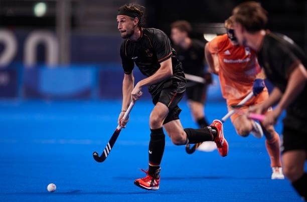 Florian Fuchs of Germany controls the ball during the Men's Pool B - Hockey Match between Germany and Netherlands on day seven of the Tokyo 2020...