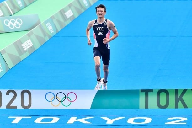 Alex YEE of Great Britain celebrates the victory as he crosses the finish line during the Triathlon Mixed Relay at Odaiba Marine Park on July 31,...