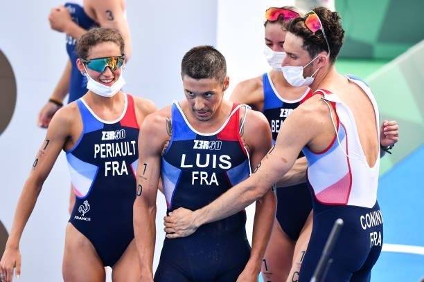 Leonie PERIAULT, Dorian CONINX, Cassandre BEAUGRAND and Vincent LUIS of France celebrate their 3rd place during the Triathlon Mixed Relay at Odaiba...