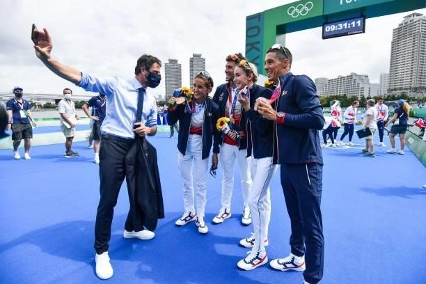 Tony ESTANGUET president of Paris 2024 Commitee poses for a picture with bronze medalist Leonie PERIAULT of France, Dorian CONINX of France Cassandre...