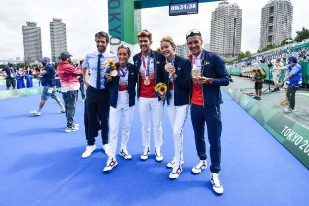 Tony ESTANGUET president of Paris 2024 Commitee poses for a picture with bronze medalist Leonie PERIAULT of France, Dorian CONINX of France Cassandre...