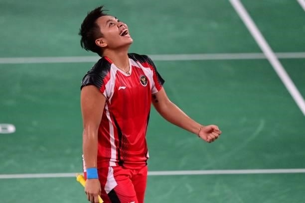 Indonesia's Apriyani Rahayu celebrates winning with Indonesia's Greysia Polii in their women's doubles badminton semi-final match against South...