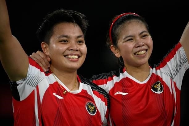 Indonesia's Greysia Polii and Indonesia's Apriyani Rahayu celebrate after winning their women's doubles badminton semi-final match against South...