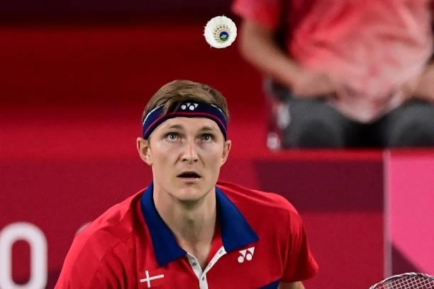 Denmark's Viktor Axelsen prepares to hit a shot to China's Shi Yuqi in their men's singles badminton quarter final match during the Tokyo 2020...