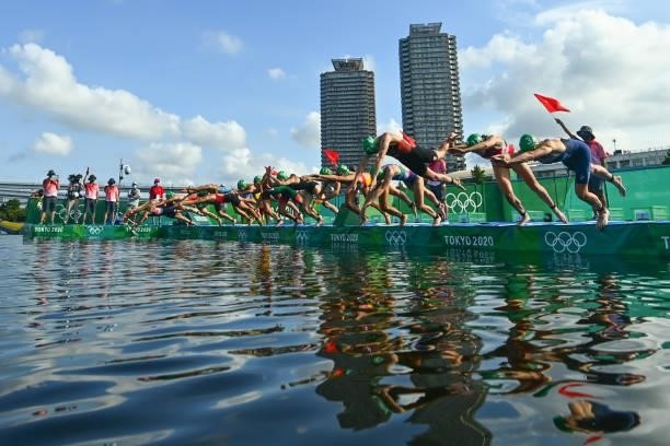 Illustration picture shows a general view of the mass start during the Triathlon Mixed Relay at Odaiba Marine Park on July 31, 2021 in Tokyo, Japan.