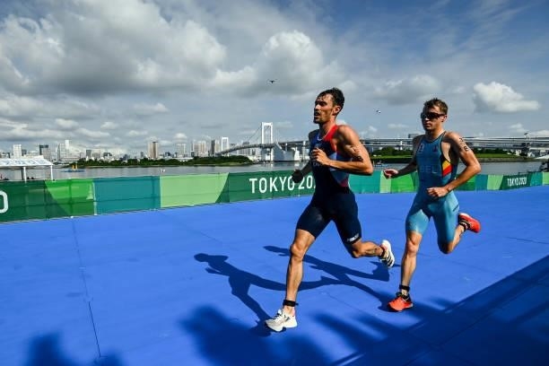 Dorian CONINX of France and Marten VAN RIEL of Belgium during the Triathlon Mixed Relay at Odaiba Marine Park on July 31, 2021 in Tokyo, Japan.