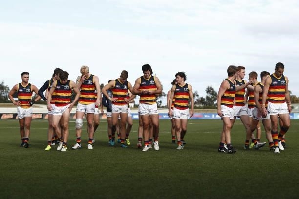 Adelaide Crows players leave the field after a loss during the 2021 AFL Round 20 match between the Western Bulldogs and the Adelaide Crows at Mars...