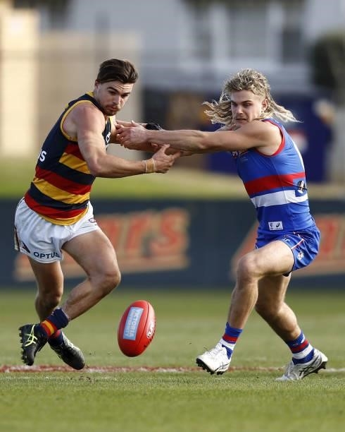 Ben Keays of the Crows and Bailey Smith of the Bulldogs compete for the ball during the 2021 AFL Round 20 match between the Western Bulldogs and the...