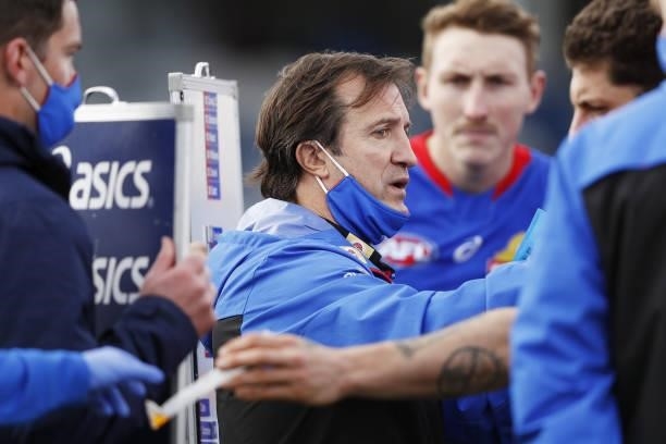 Luke Beveridge, Senior Coach of the Bulldogs addresses his players during the 2021 AFL Round 20 match between the Western Bulldogs and the Adelaide...