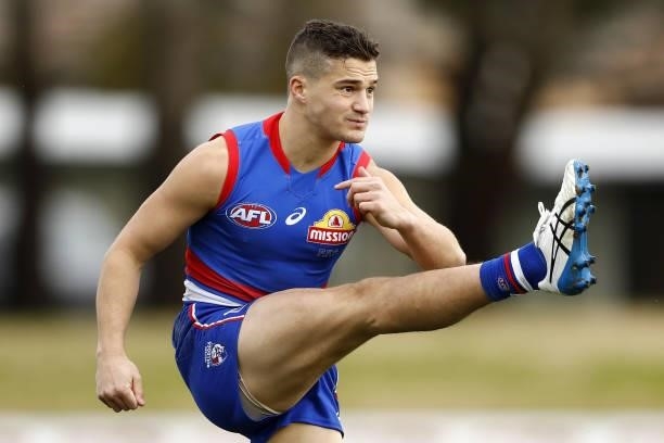 Riley Garcia of the Bulldogs kicks the ball during the 2021 AFL Round 20 match between the Western Bulldogs and the Adelaide Crows at Mars Stadium on...