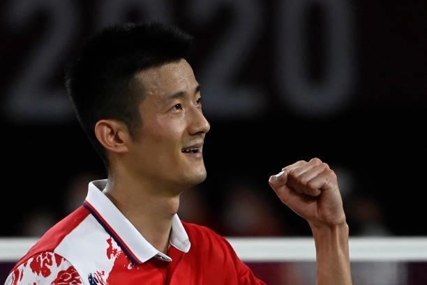 China's Chen Long celebrates after beating Taiwan's Chou Tien-chen in their men's singles badminton quarter final match during the Tokyo 2020 Olympic...