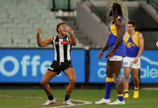 Isaac Quaynor of the Magpies celebrates a goal during the 2021 AFL Round 20 match between the Collingwood Magpies and the West Coast Eagles at the...