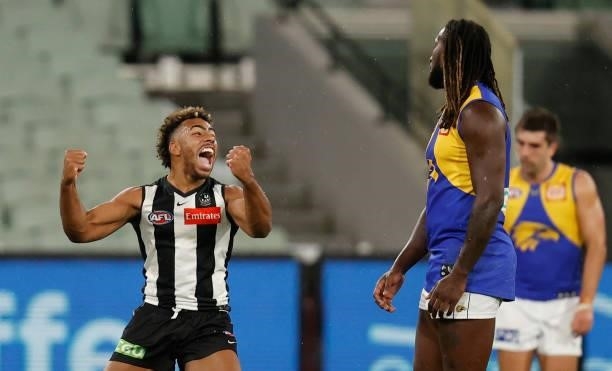Isaac Quaynor of the Magpies celebrates a goal during the 2021 AFL Round 20 match between the Collingwood Magpies and the West Coast Eagles at the...
