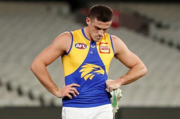 Jake Waterman of the Eagles looks dejected after a loss during the 2021 AFL Round 20 match between the Collingwood Magpies and the West Coast Eagles...