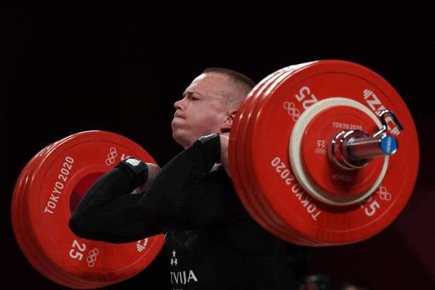 Latvia's Ritvars Suharevs competes in the men's 81kg weightlifting competition during the Tokyo 2020 Olympic Games at the Tokyo International Forum...