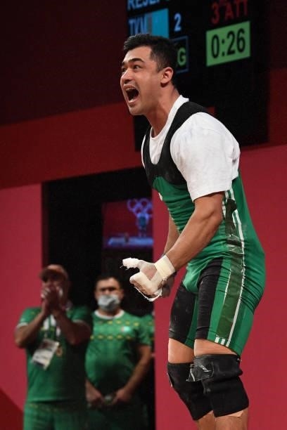 Competes in the men's 81kg weightlifting competition during the Tokyo 2020 Olympic Games at the Tokyo International Forum in Tokyo on July 31, 2021.