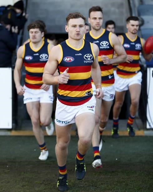 Rory Laird of the Crows runs out on to the ground during the 2021 AFL Round 20 match between the Western Bulldogs and the Adelaide Crows at Mars...